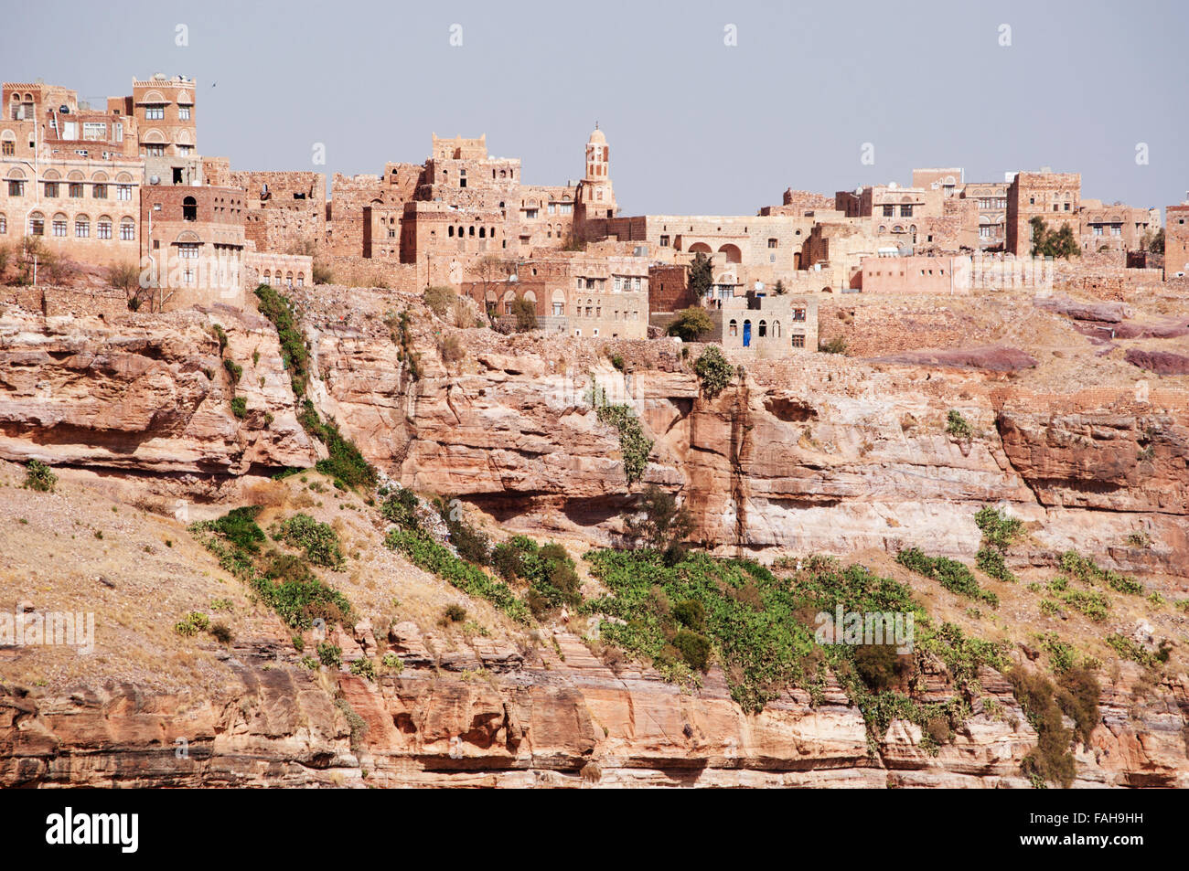 Rocce Rosse e decorate case vecchie, Kawkaban, a nord-ovest di Sana'a, città fortificata, villaggio, Repubblica dello Yemen, vita quotidiana Foto Stock