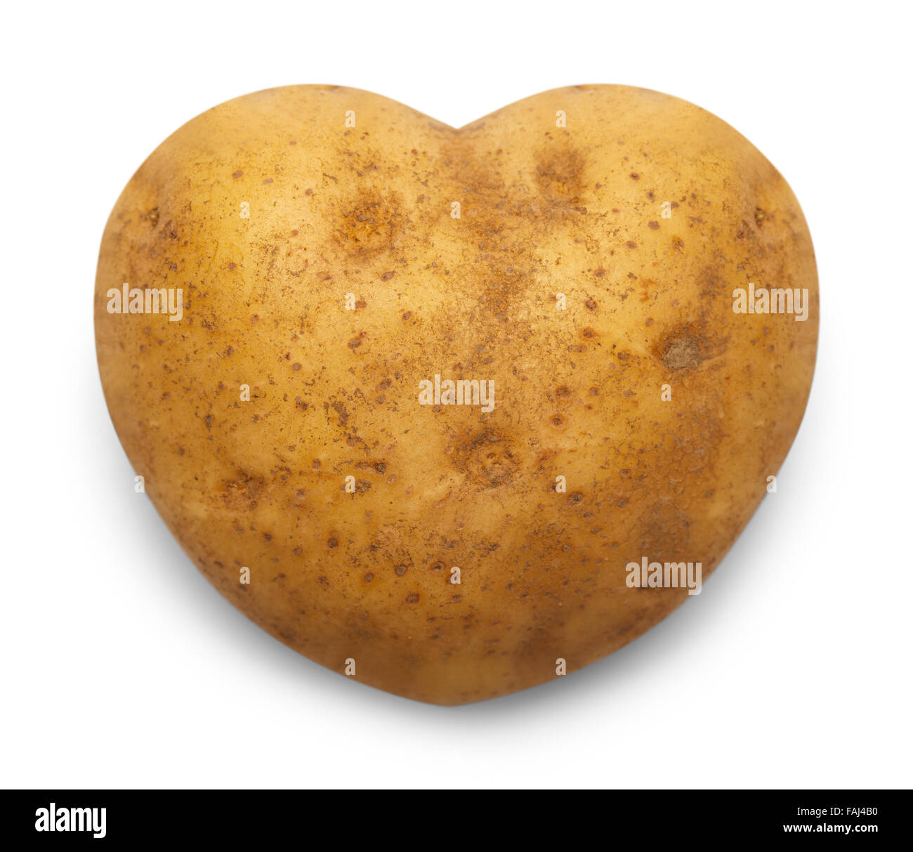 A forma di cuore isolato di patate su uno sfondo bianco. Foto Stock