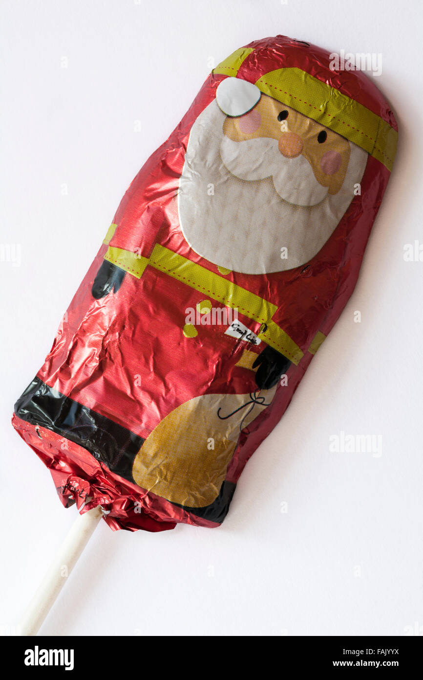 Solido cioccolato al latte santa, Fatther Natale, per lecca-lecca di cioccolato pronto per Natale su sfondo bianco Foto Stock