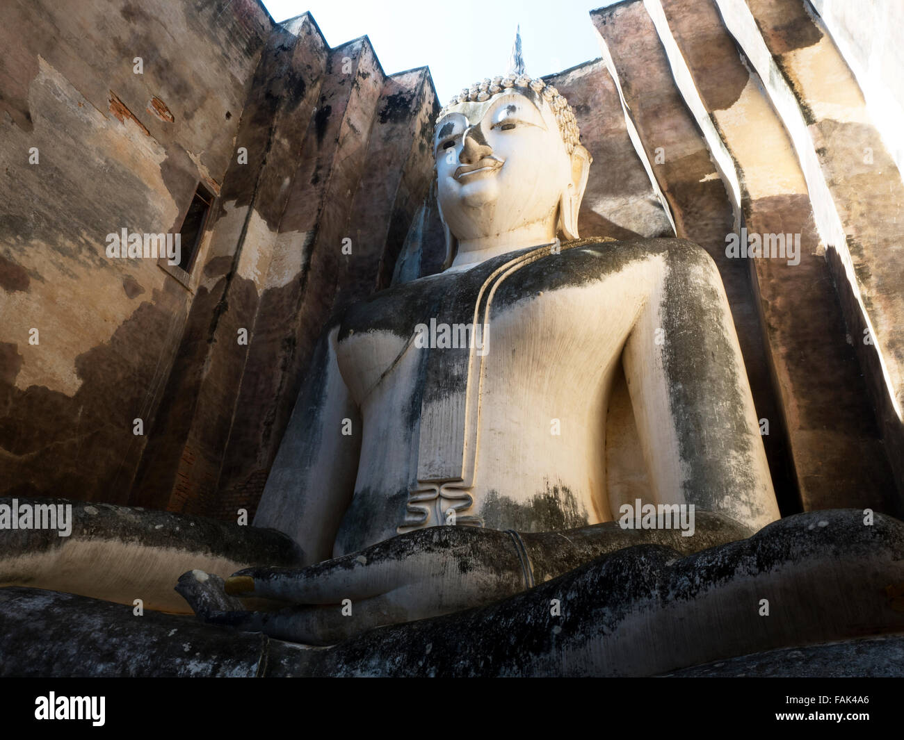 Buddha seduto, Wat Sri Chum, Sukhothai Historical Park, sito Patrimonio Mondiale dell'UNESCO, Mueang Kao, Sukhothai, Thailandia Foto Stock