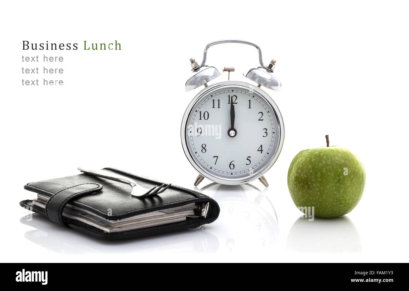 Forcella su Filofax con Apple e un orologio ma non il tempo per il pranzo Pranzo Business concetto su uno sfondo bianco con spazio di copia Foto Stock