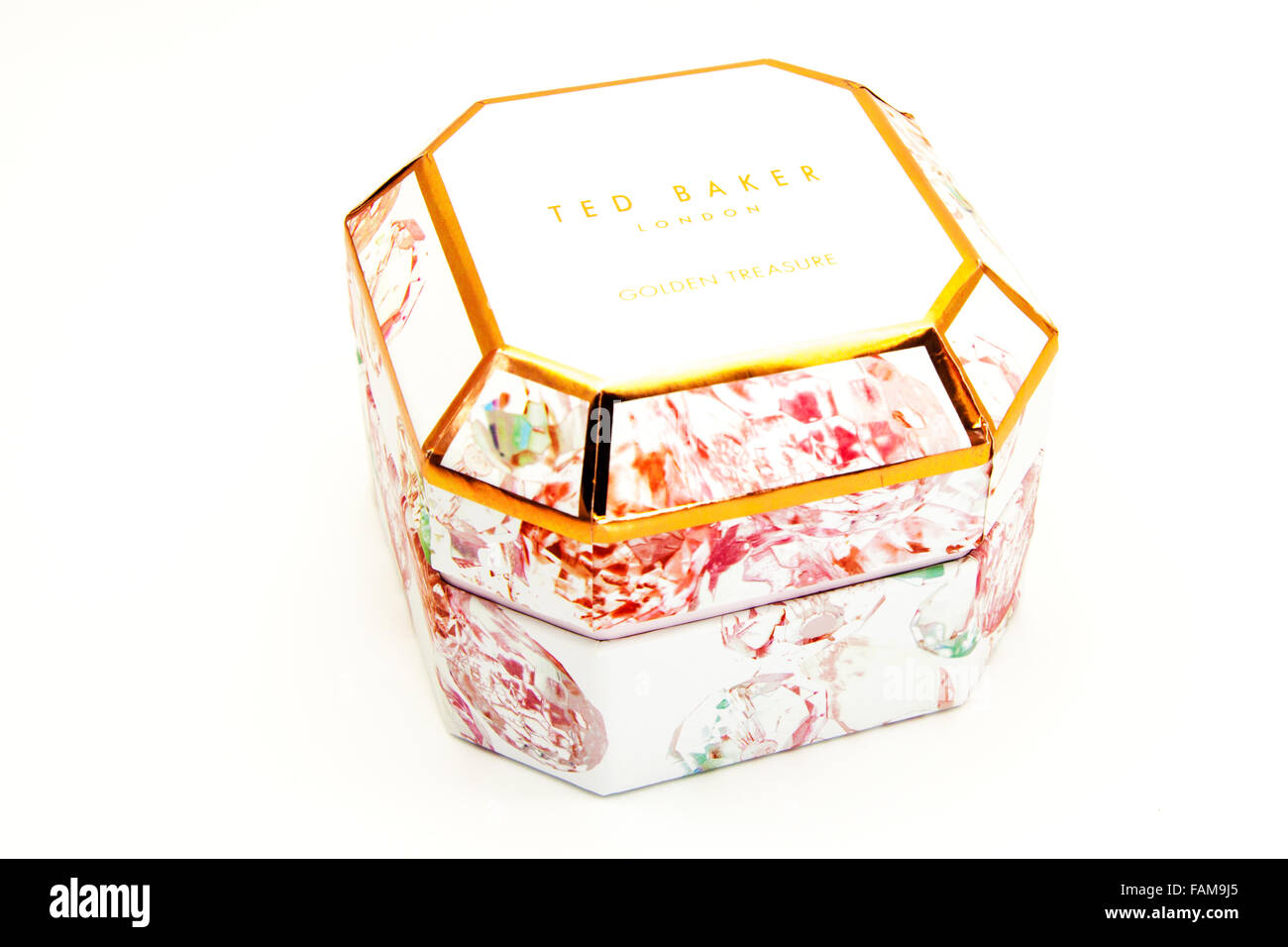Ted Baker Londra golden tesoro casella Ritaglio ritagliare uno sfondo bianco isolato di spazio di copia Foto Stock