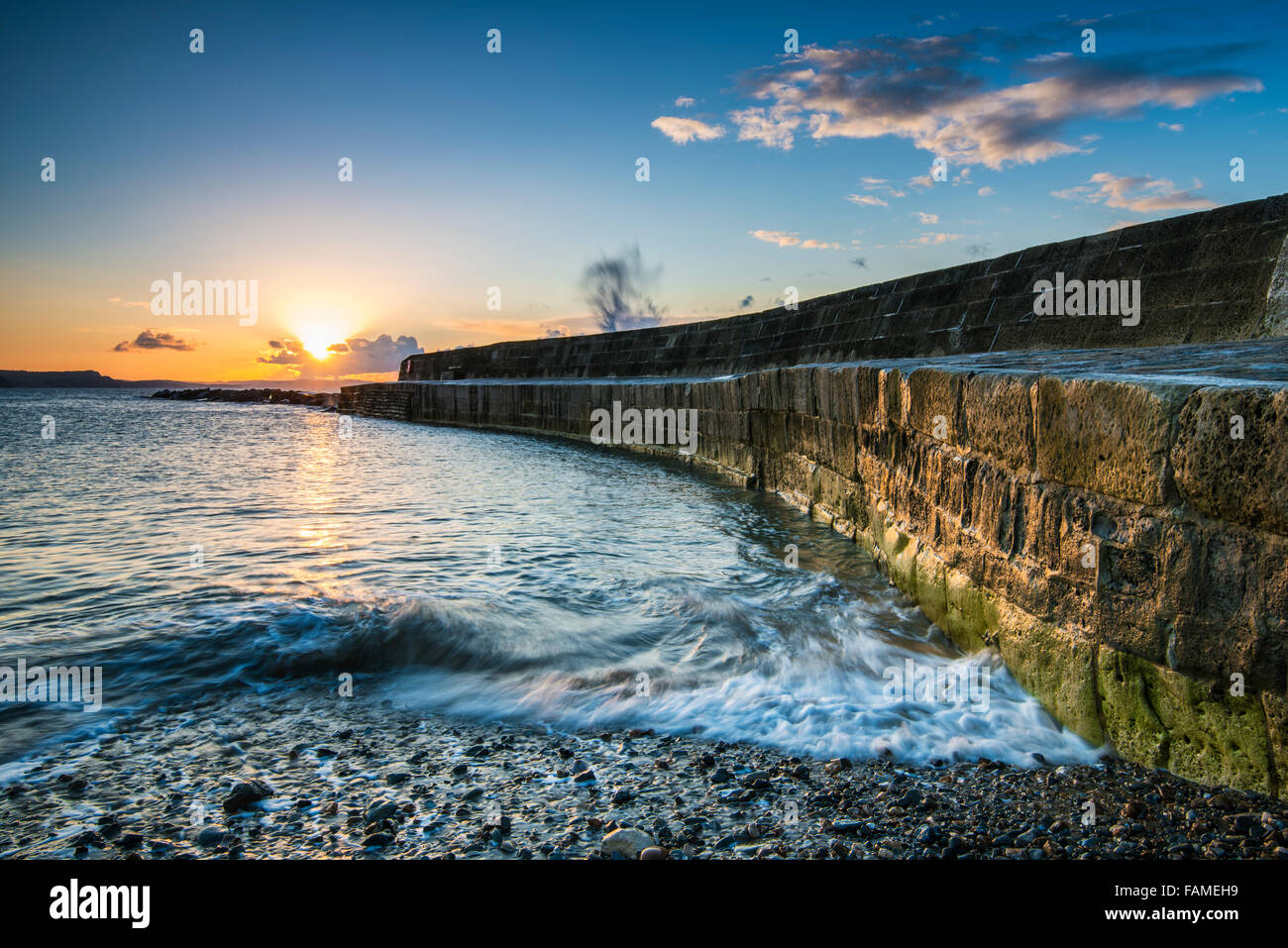 Sunrise a Lyme Regis Cobb, Dorset Foto Stock