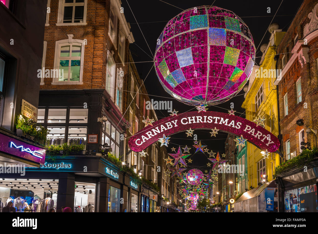 Le luci di Natale su Carnaby Street, London REGNO UNITO Foto Stock