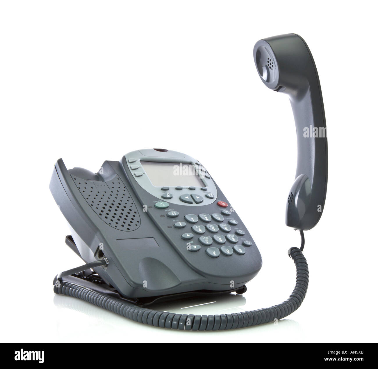 Grigio telefono ufficio isolato su uno sfondo bianco con ricevitore flottante Foto Stock