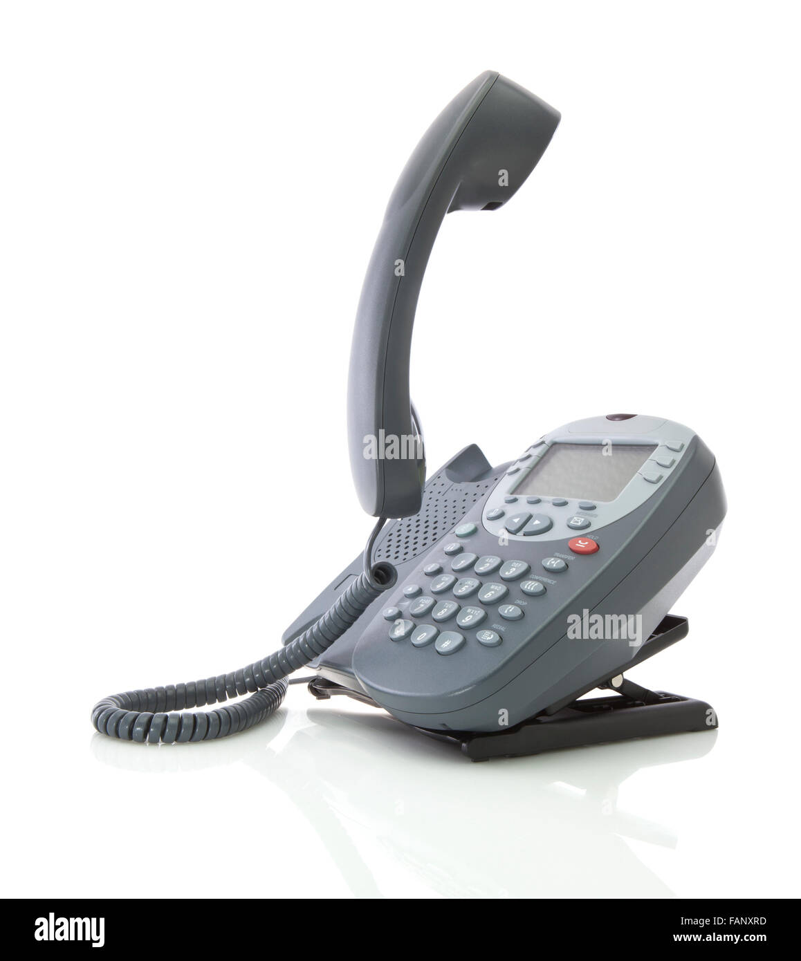 Grigio telefono ufficio isolato su uno sfondo bianco con ricevitore flottante Foto Stock