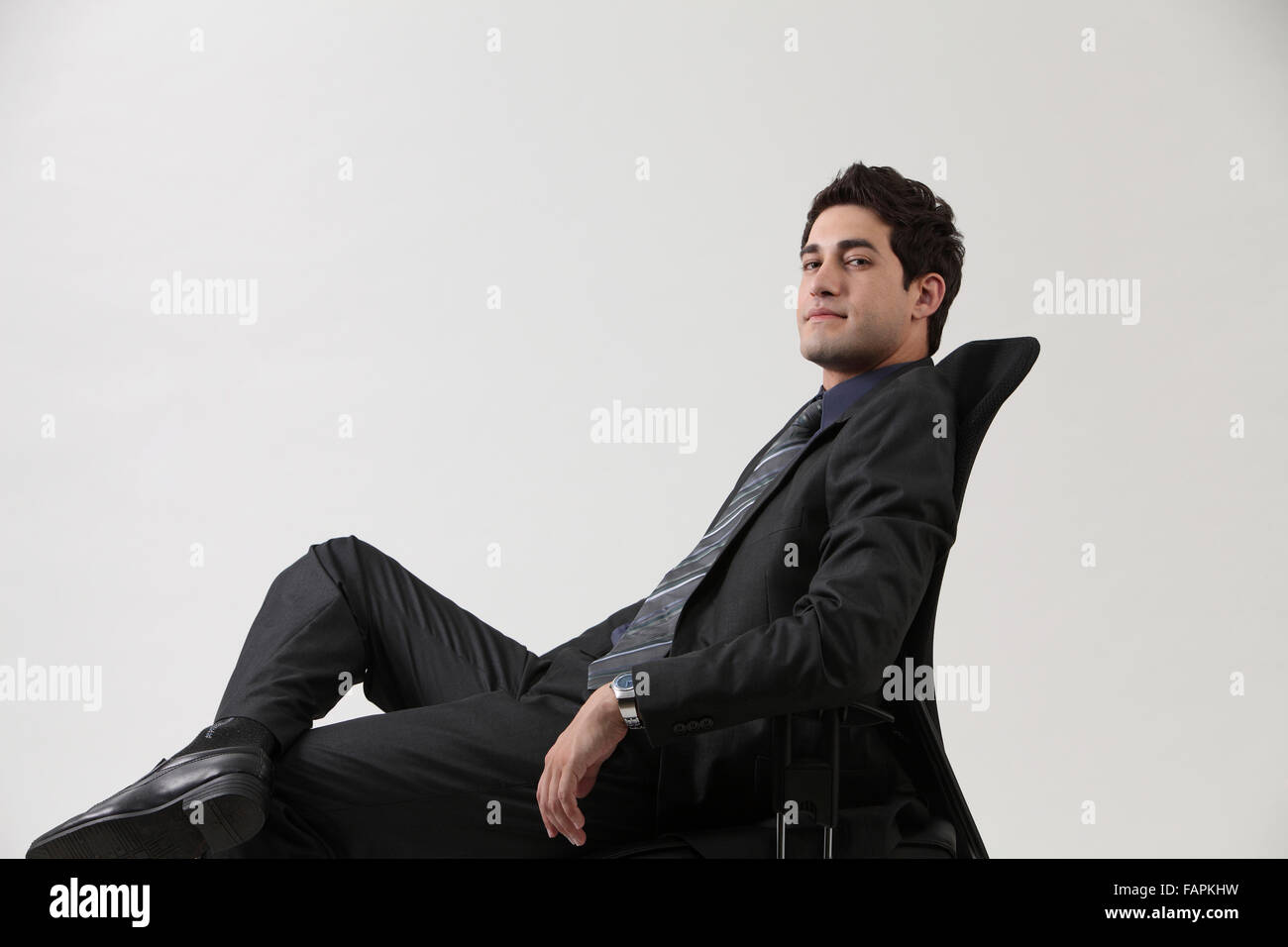 Business man in black sedia per ufficio Foto Stock