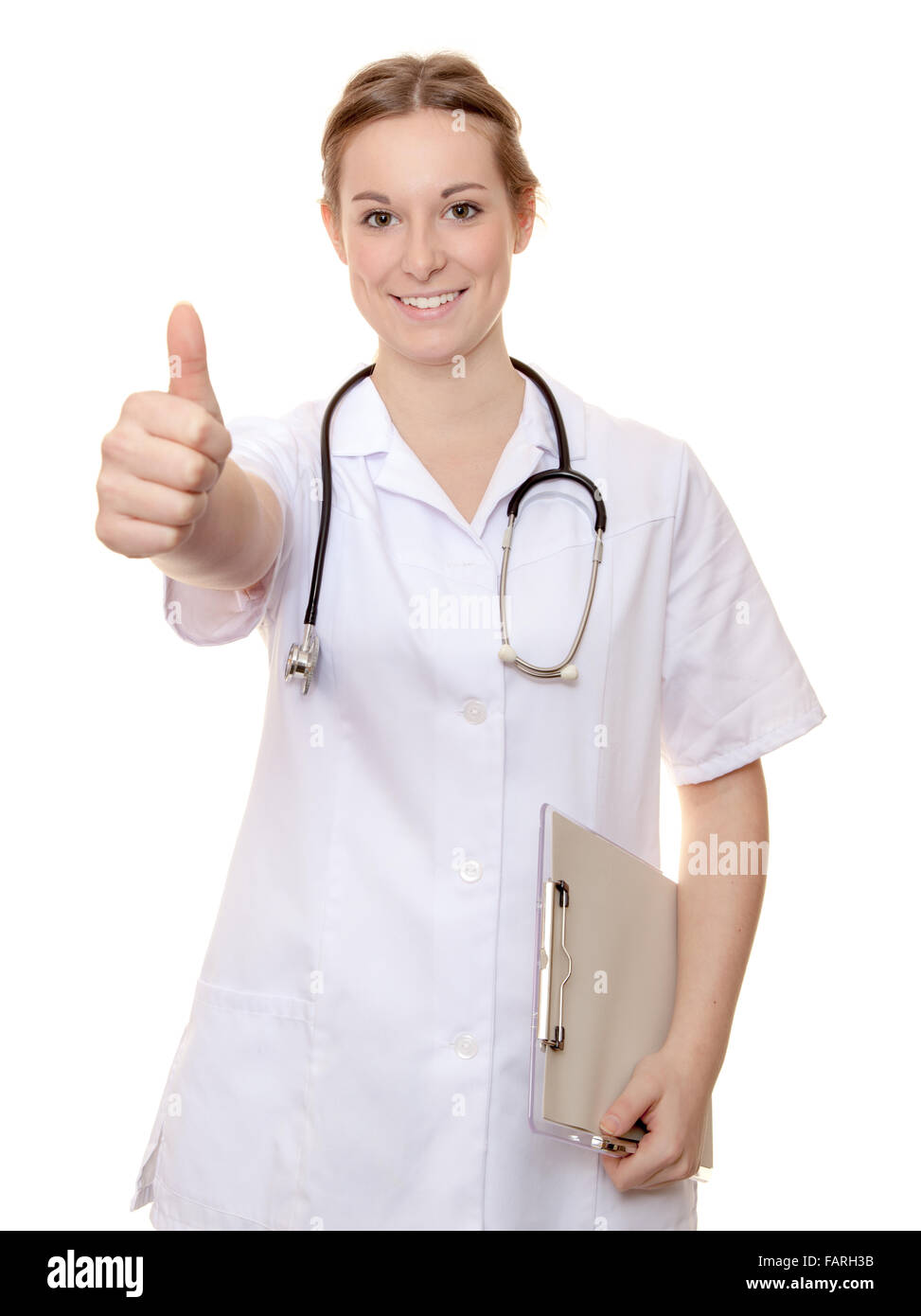 Attraente infermiera mostra Thumbs up. Tutto su sfondo bianco. Foto Stock