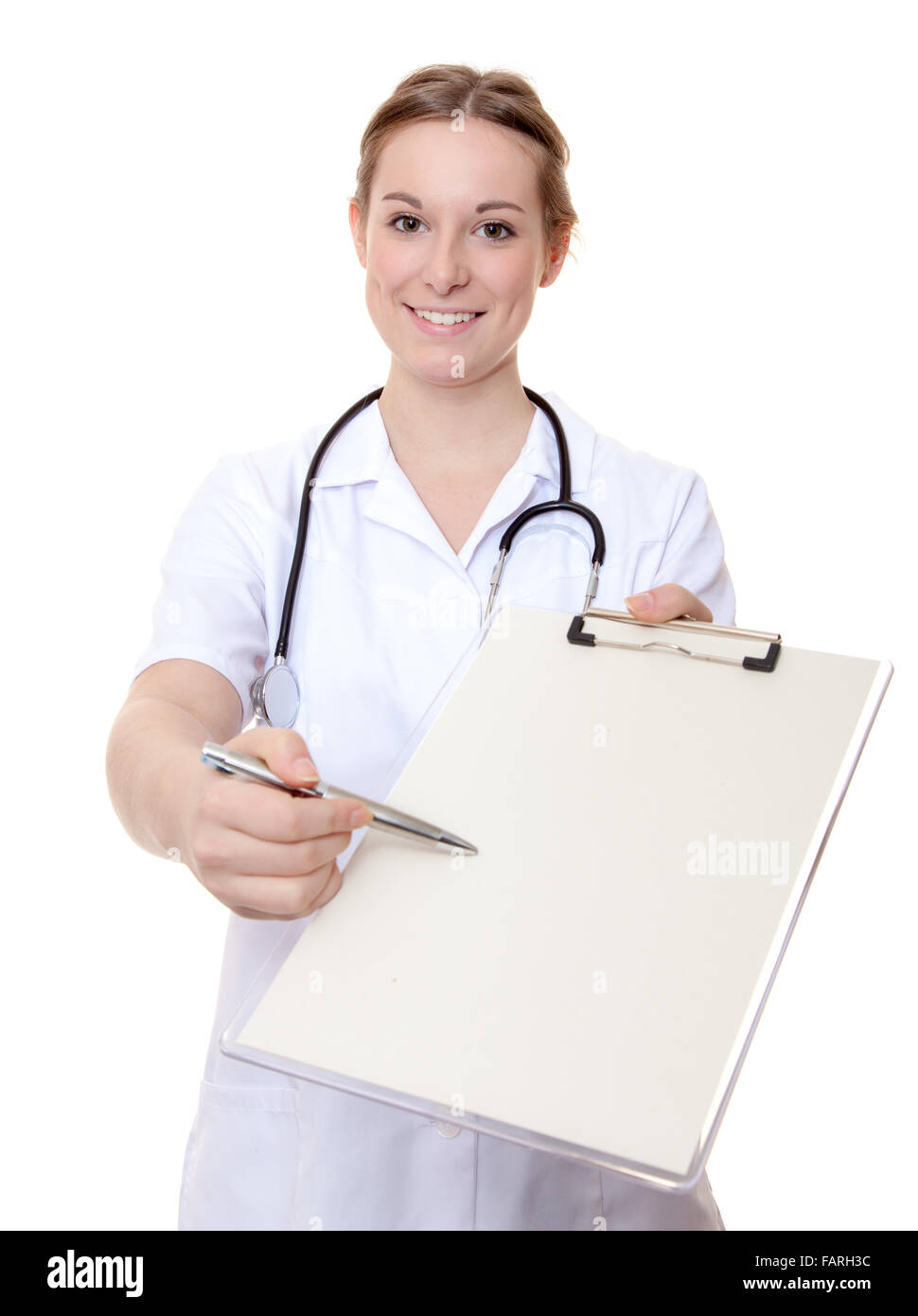 Attraente infermiera con appunti. Tutto su sfondo bianco. Foto Stock