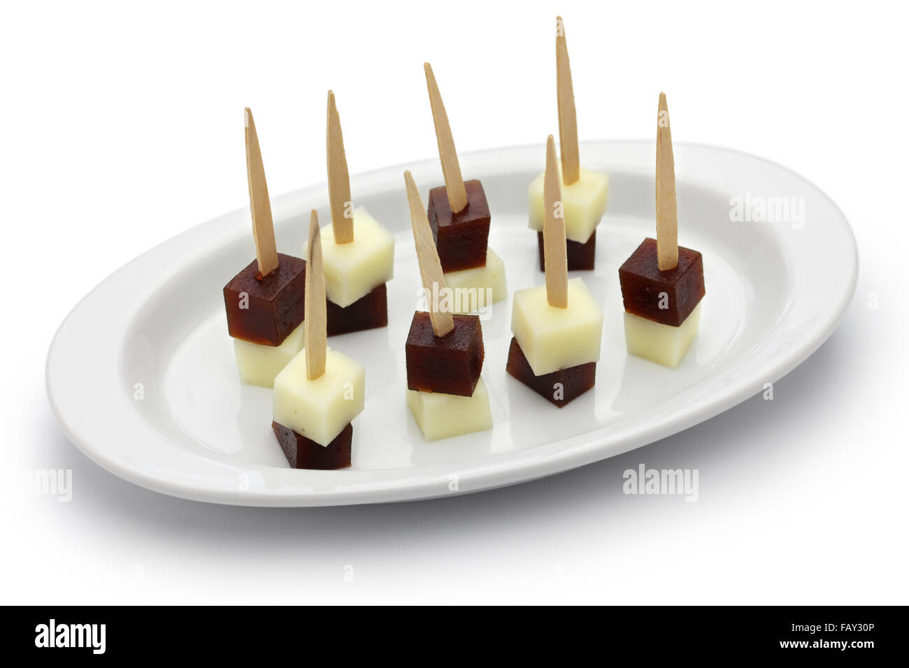Tapas spagnole pinchos, machego formaggio e membrillo Foto Stock