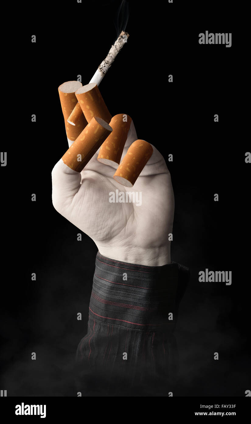 Surreale immagine di una mano umana tenendo una sigaretta Foto Stock