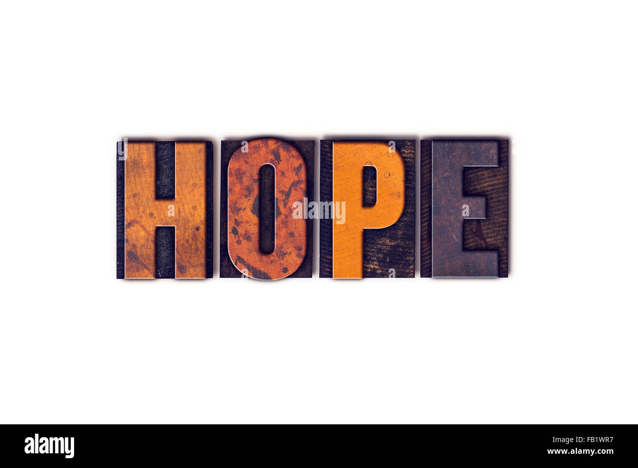 La parola "speranza" scritto in isolati di legno vintage tipo di stampa in rilievo su uno sfondo bianco. Foto Stock