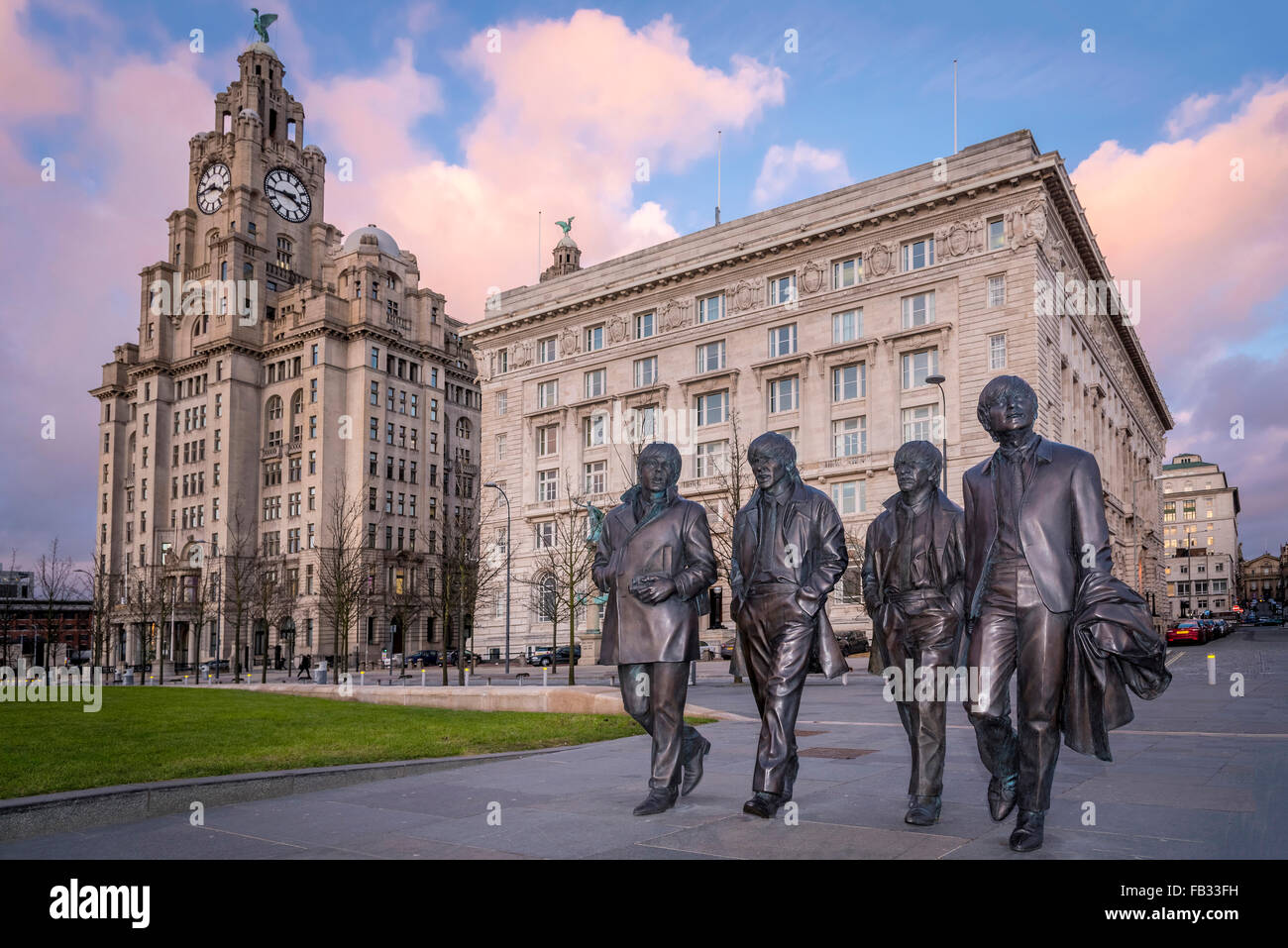 Una statua del Beatles a Liverpool pierhead. Merseyside North West England Foto Stock