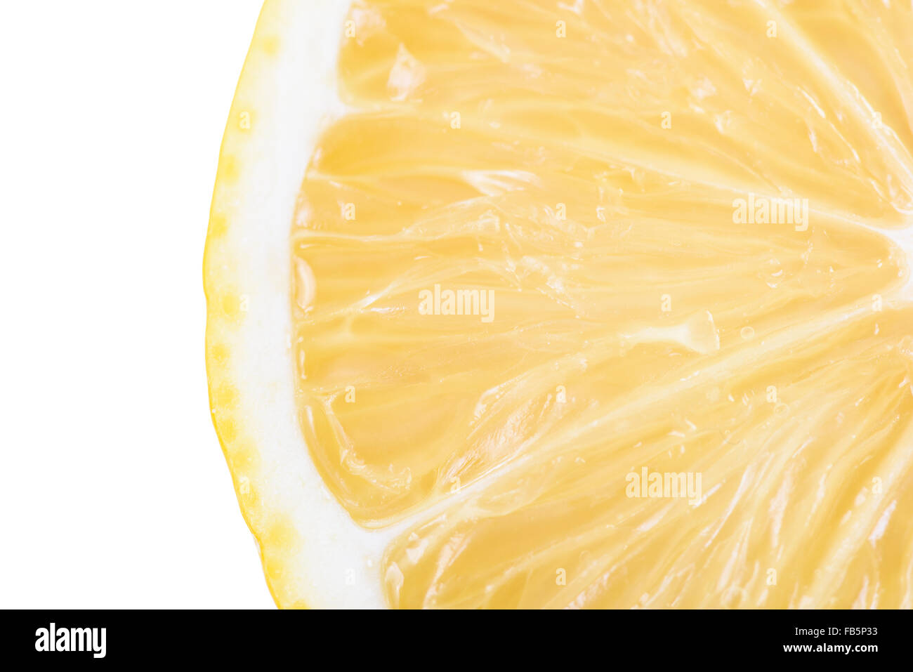 Giallo fresco fetta di limone interno Foto Stock