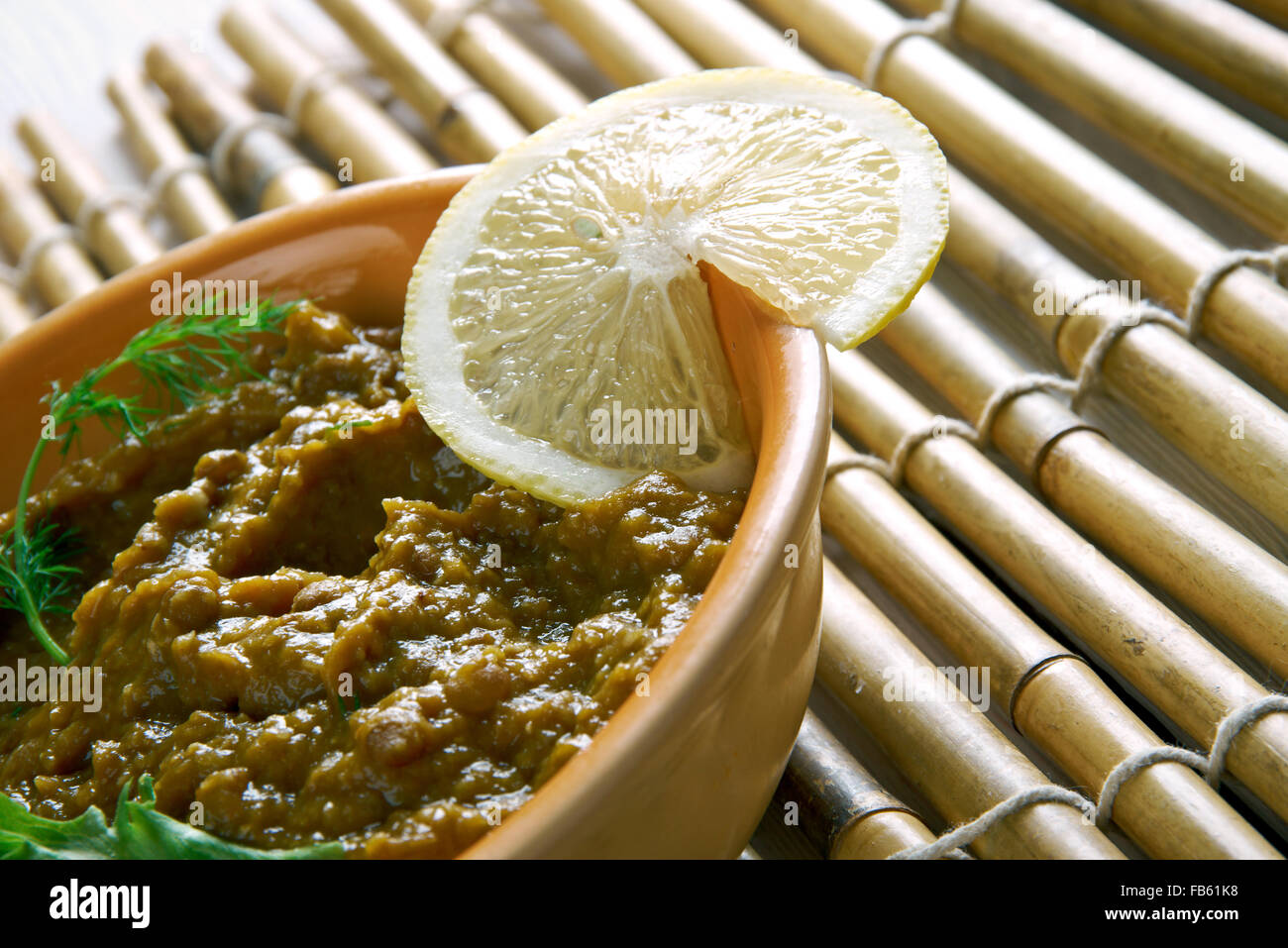Khichra - variazione del piatto Haleem, popolare con i musulmani del Sud Asia. composta di carni bovine, lenticchie e spezie Foto Stock