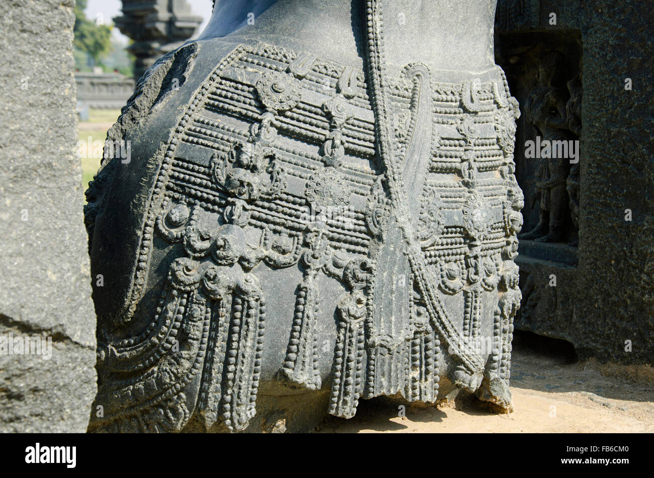 Il carving sul pilastro, tempio complesso, Warangal fort, Warangal, Telangana, India Foto Stock