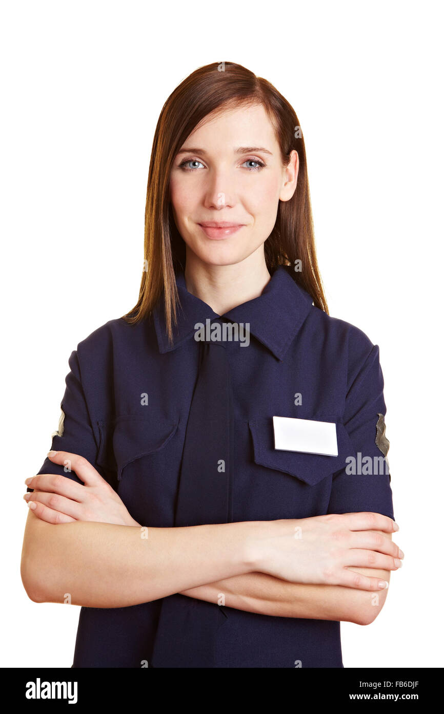 Ritratto di una giovane donna funzionario di polizia con le braccia incrociate Foto Stock