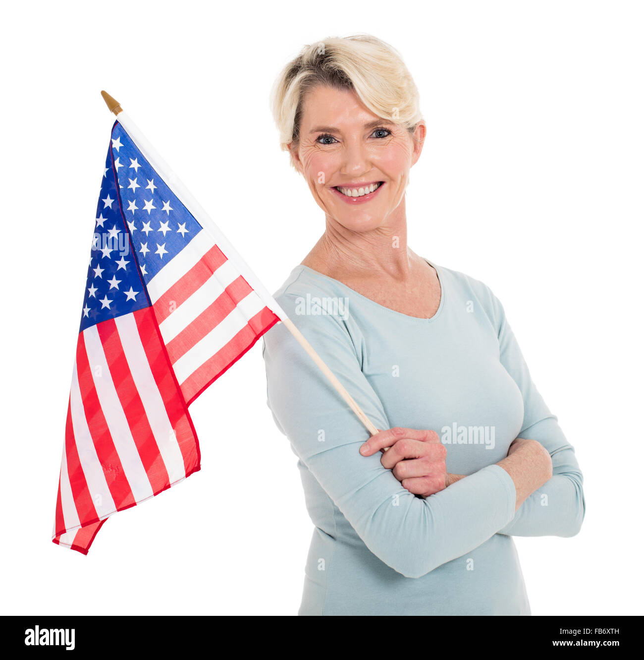 Ritratto di donna senior holding bandiera americana Foto Stock