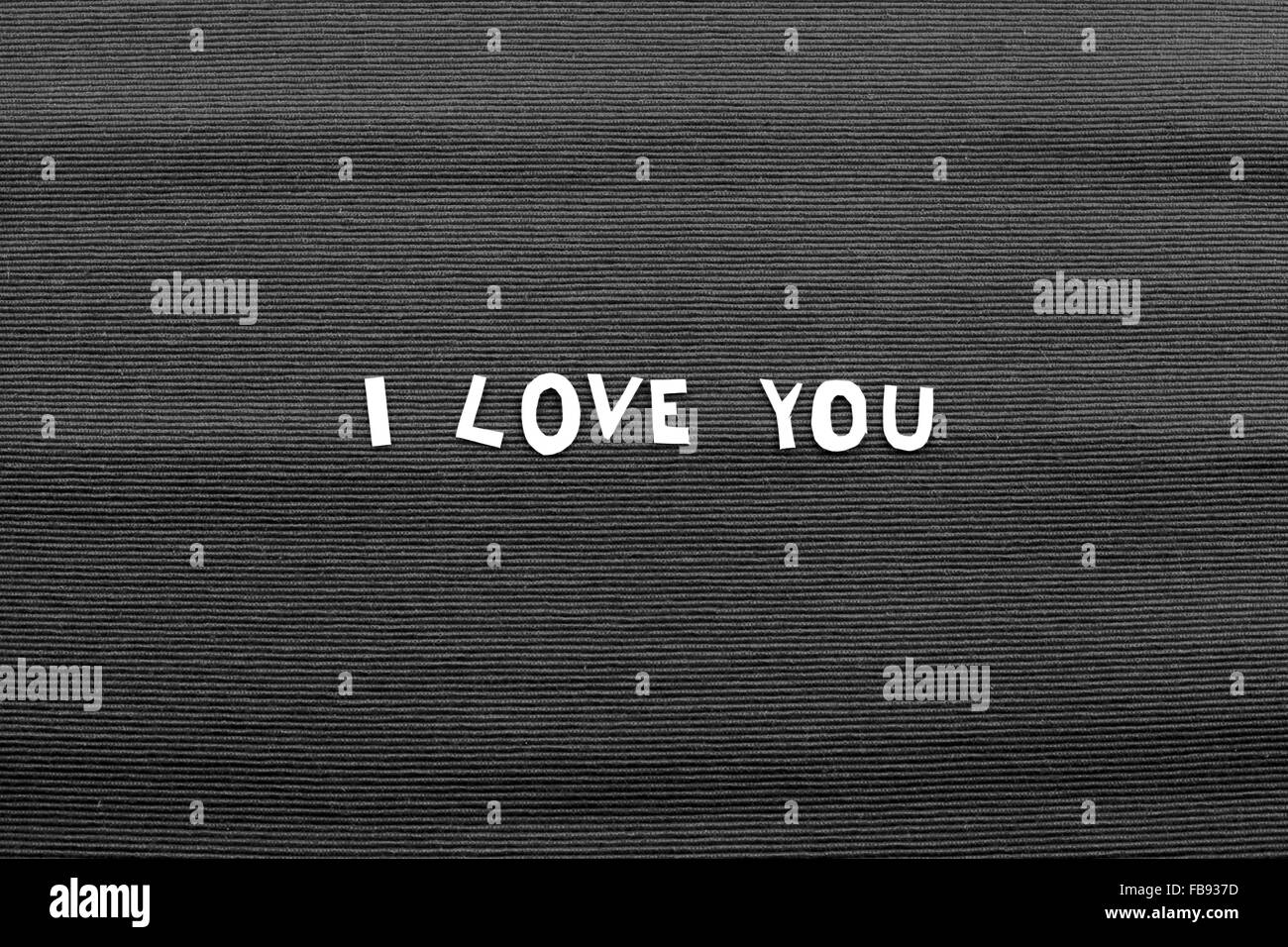 Ti Amo nota sul tessuto grigio Foto Stock