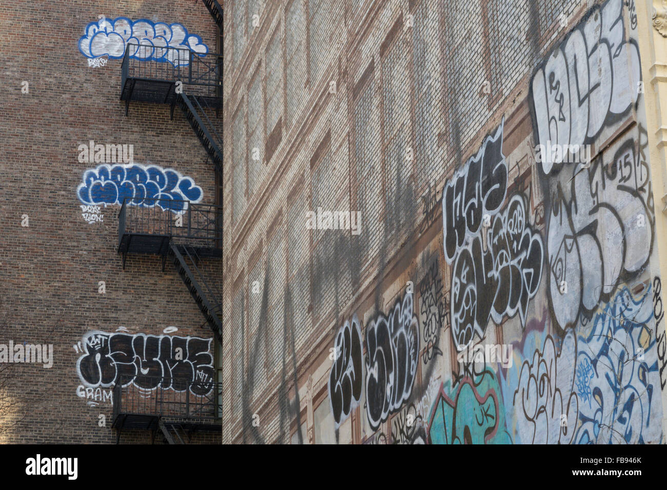 Graffiti esterni di edifici a SoHo, New York Foto Stock