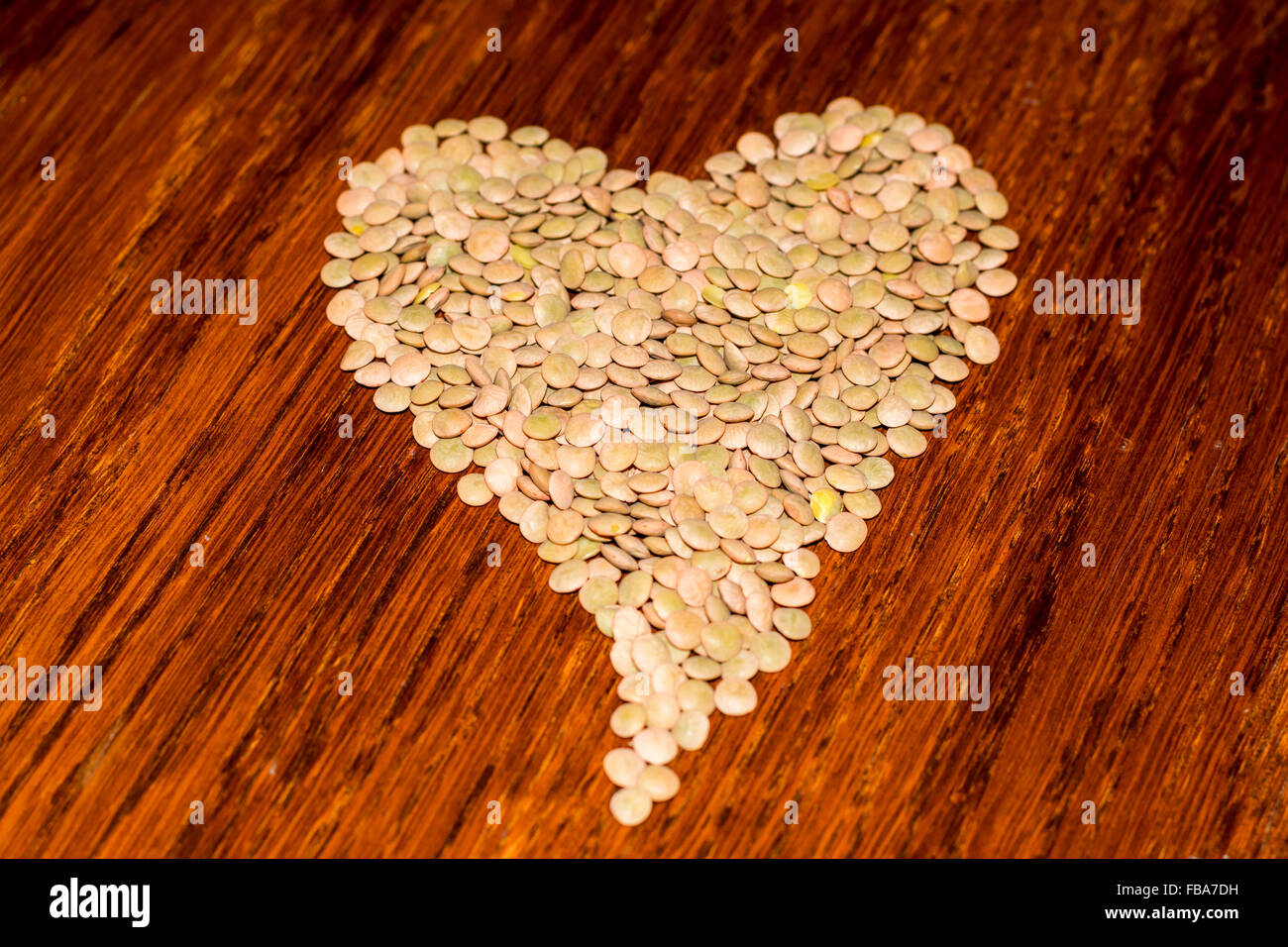 Lenticchie disposizione in forma di cuore Foto Stock