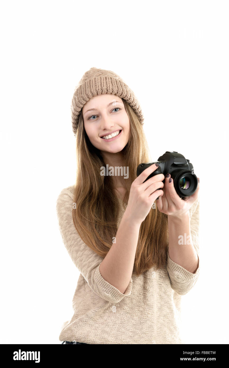 Gentile sorridente fotografo femmina holding fotocamera reflex, Fotografia di viaggio, hobby, adolescenti attività Foto Stock