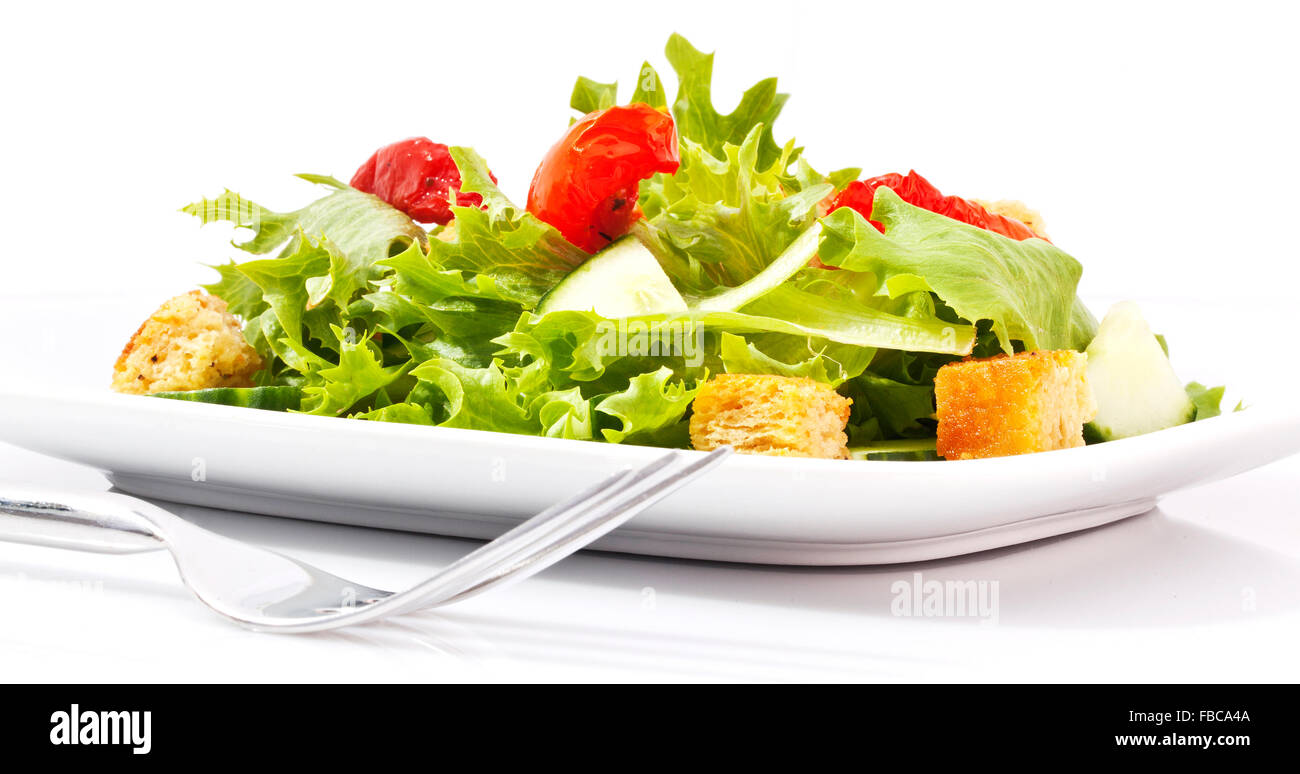 Insalata verde con pomodori secchi Foto Stock