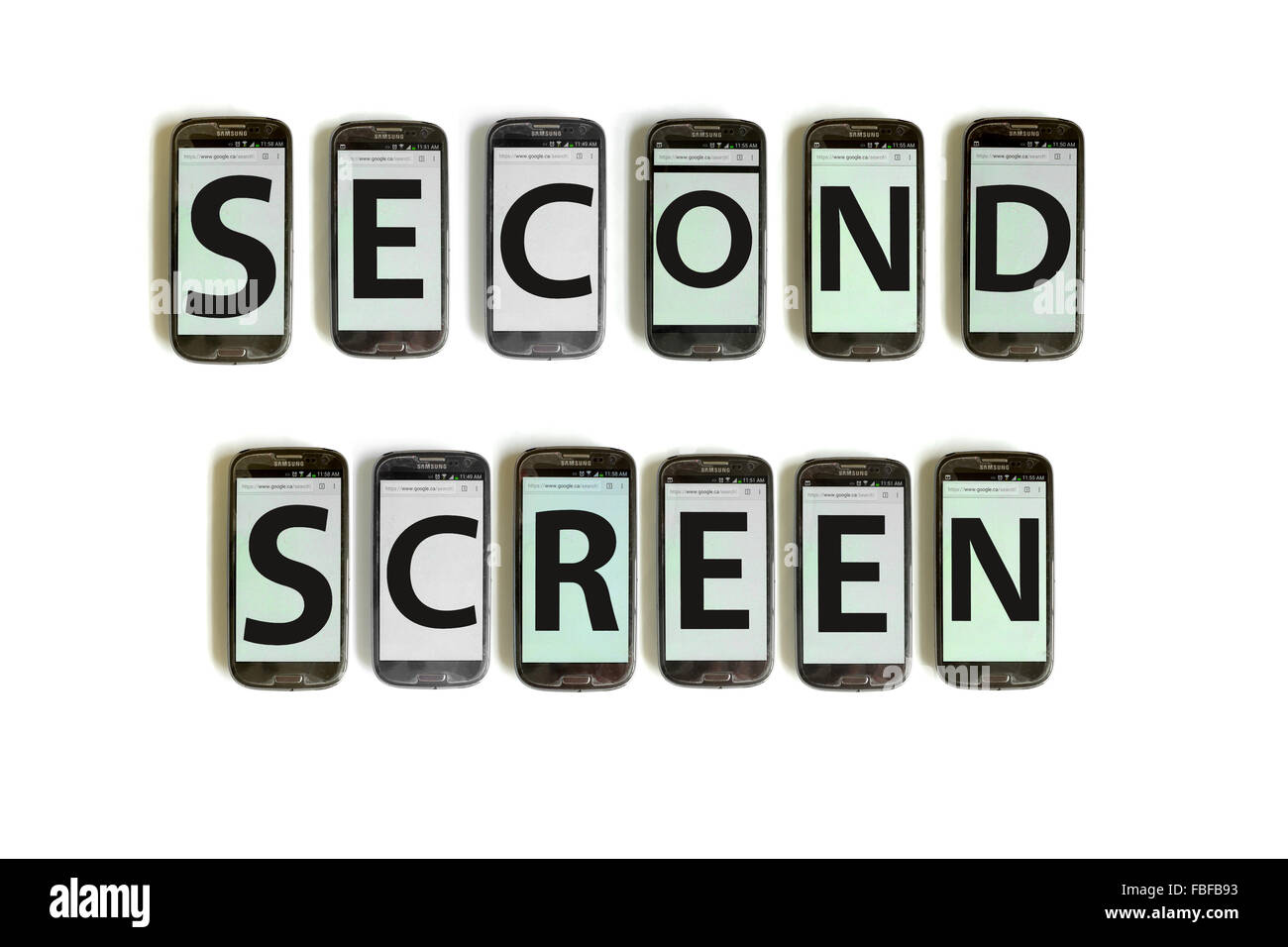 Scaricare scritto sullo schermo di smartphone fotografati contro uno sfondo bianco. Foto Stock