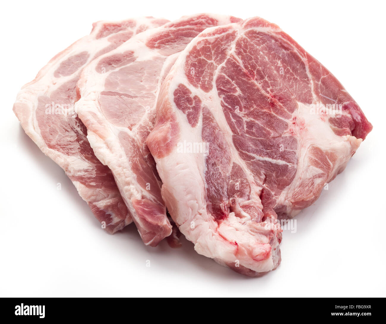 Carne di maiale cruda le fette su uno sfondo bianco. Foto Stock