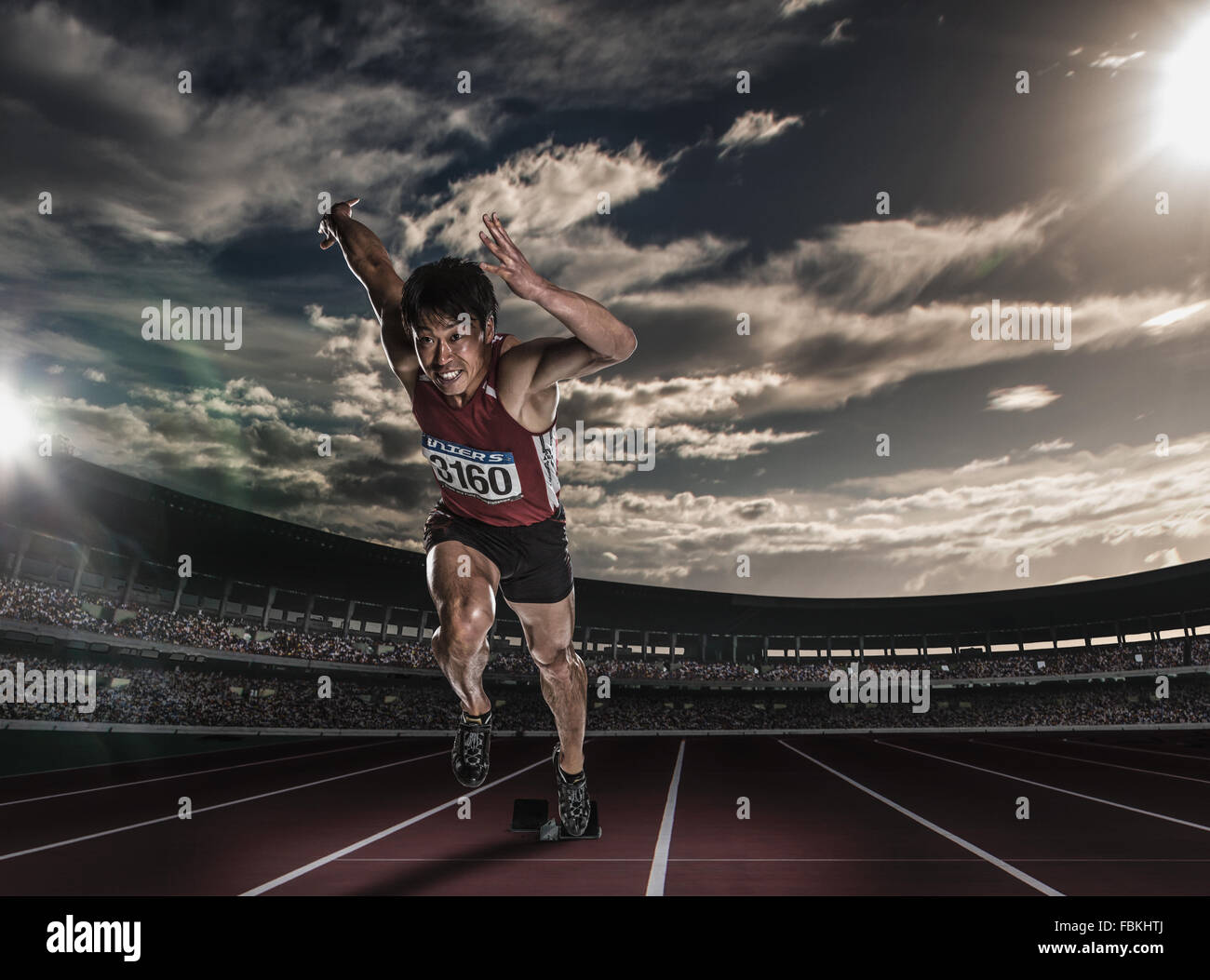 Giapponese atleta maschio in esecuzione Foto Stock