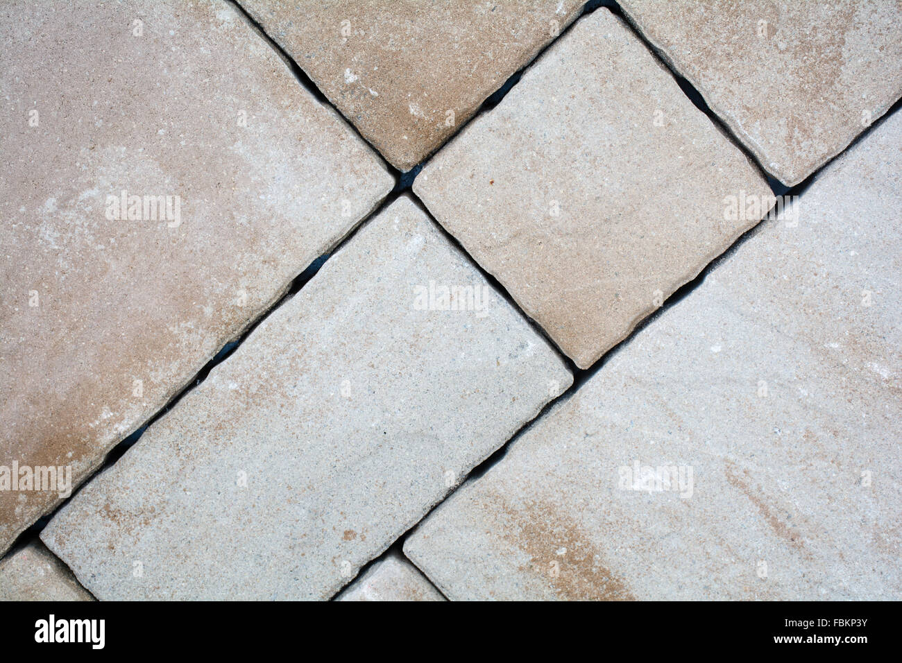 Sfondo di granito pietre per pavimentazione impilati, lastricatore e il cubo. Foto Stock