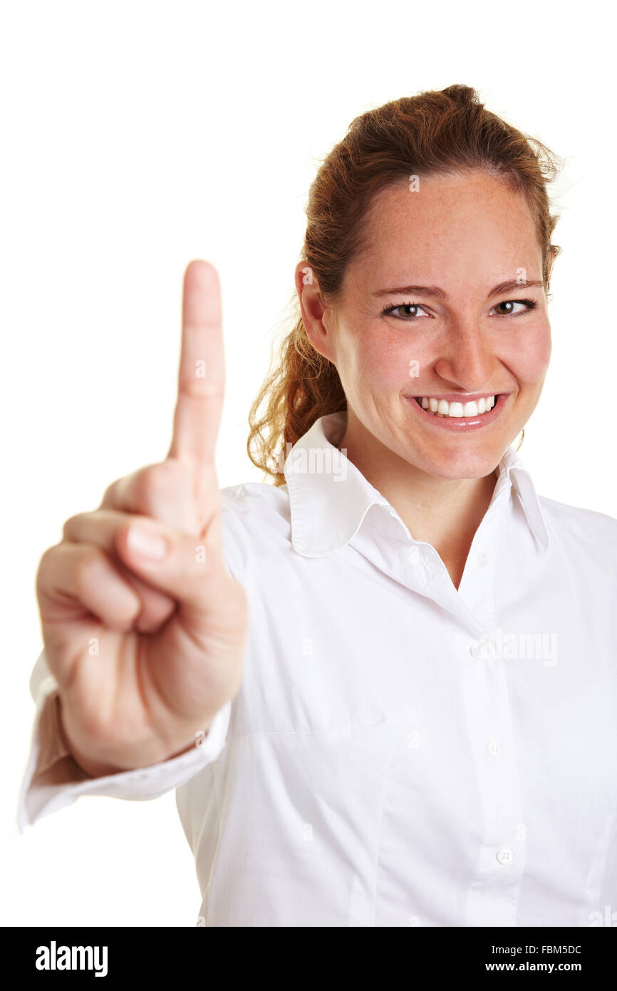 Happy business donna mentre tiene il suo dito indice fino Foto Stock