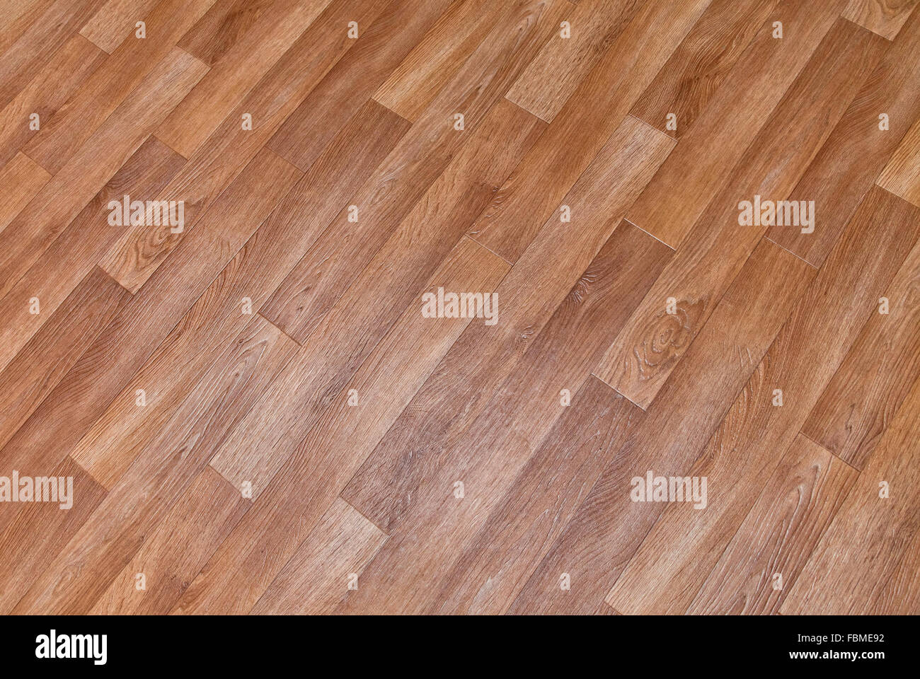 Close-up di nuovo linoleum con pattern di parquet, sfondo Foto Stock