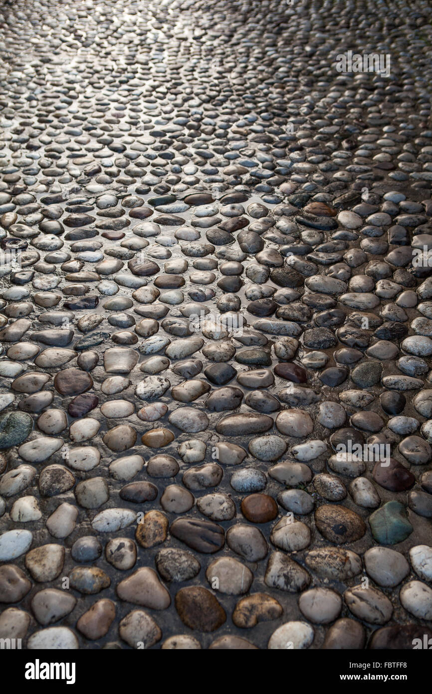 Rotonda naturale pavimento in pietra texture di sfondo Foto Stock