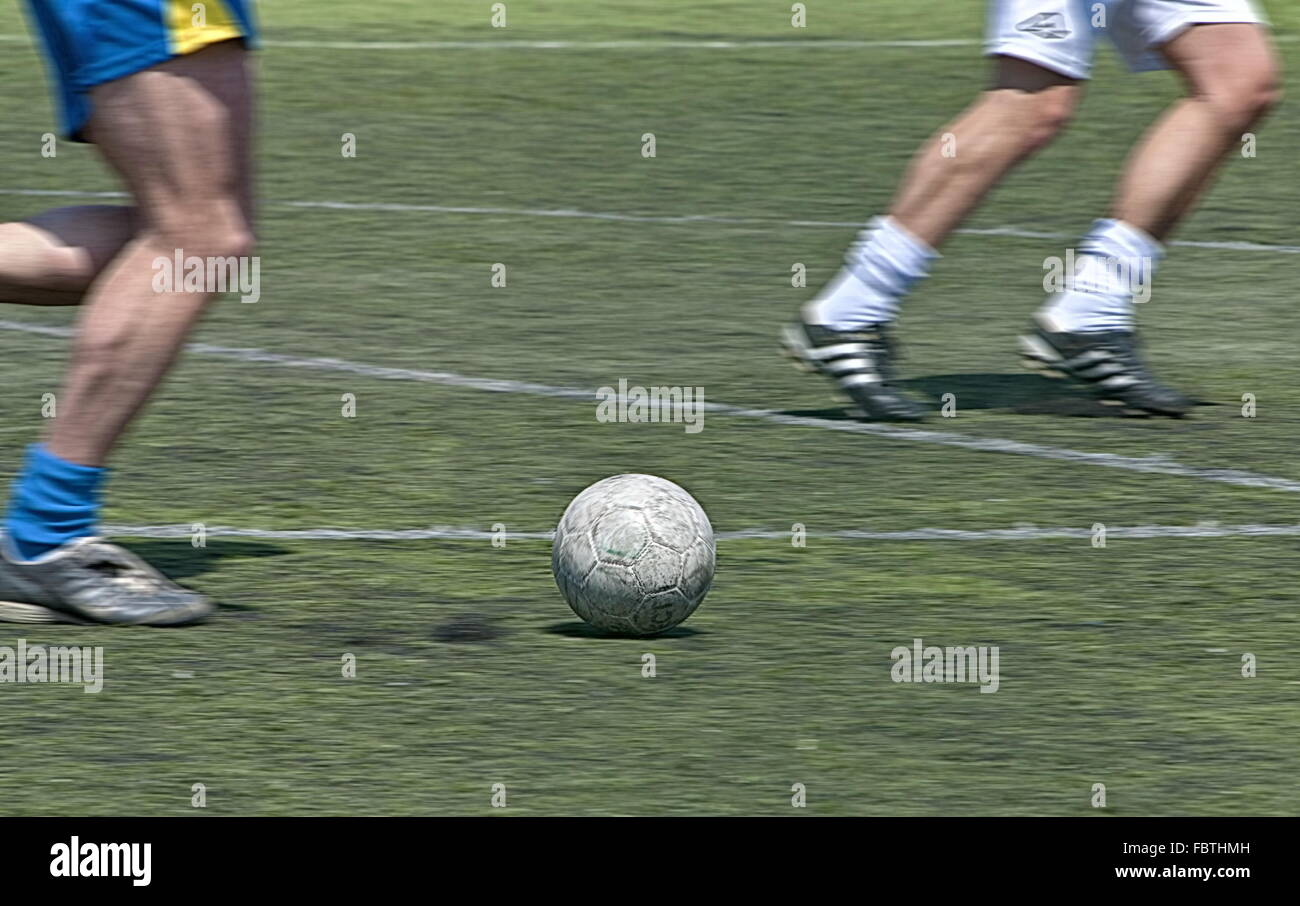 I giocatori di calcio in azione Foto Stock