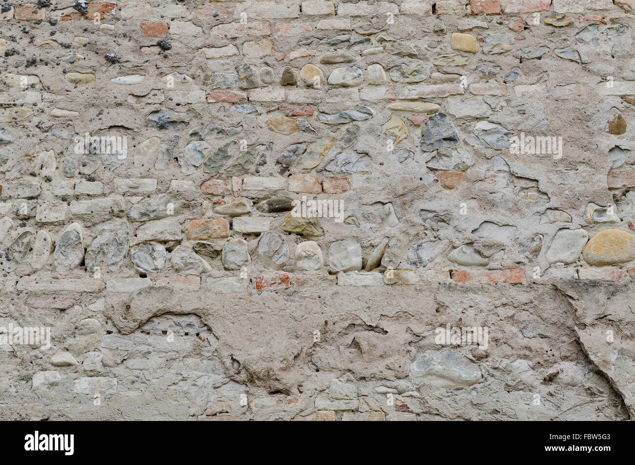 Mattoni vecchi, parete e pietra Foto Stock