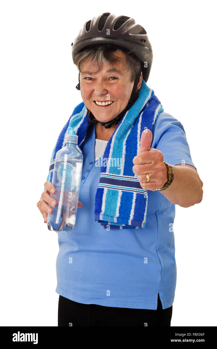 Senior ciclista donna con bottiglia di acqua Foto Stock