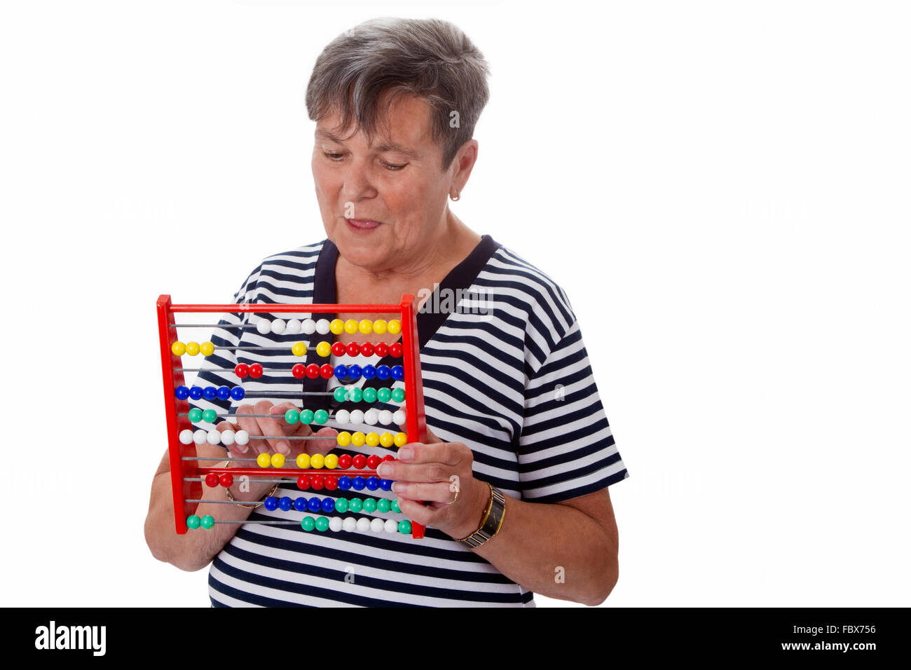 Senior donna con abacus Foto Stock