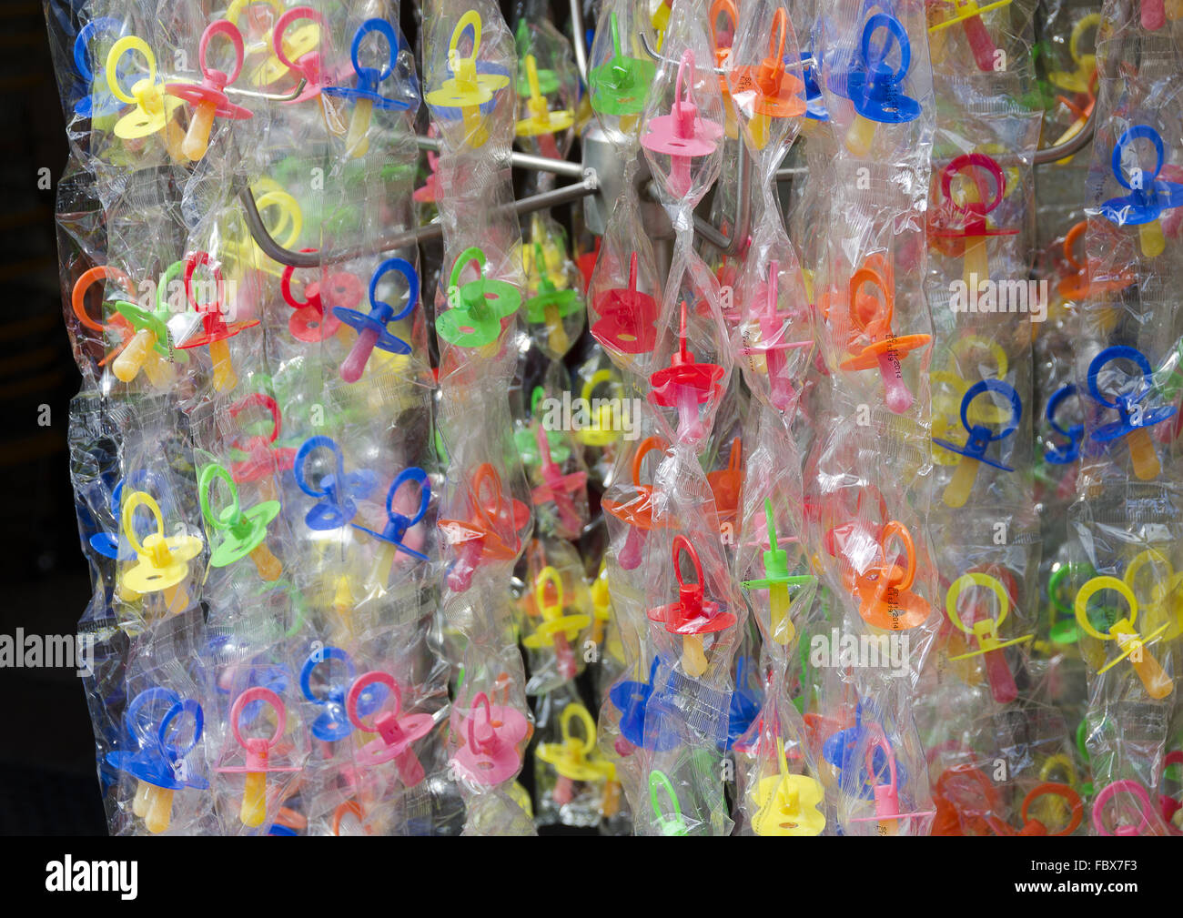 Colorfull candy succhiotti su un display stand Foto Stock