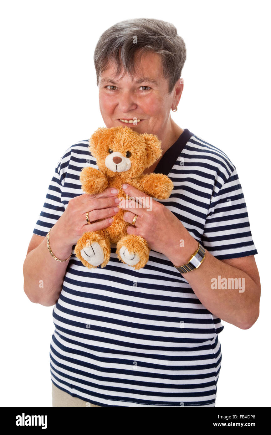 Senior donna con teddy Foto Stock