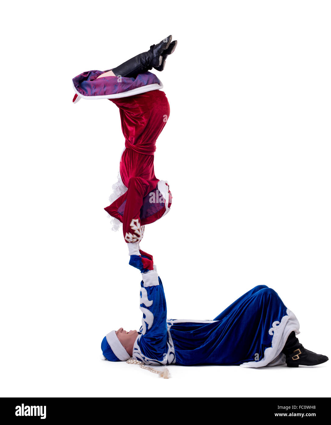 Funny acrobati eseguire nel nuovo anno costumi Foto Stock