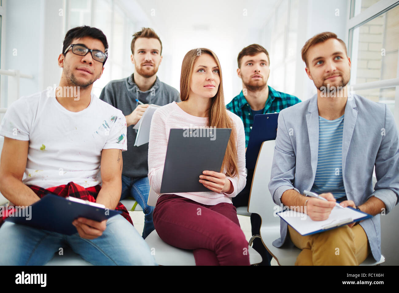 Gli studenti rendendo note a lezione sulla psicologia Foto Stock