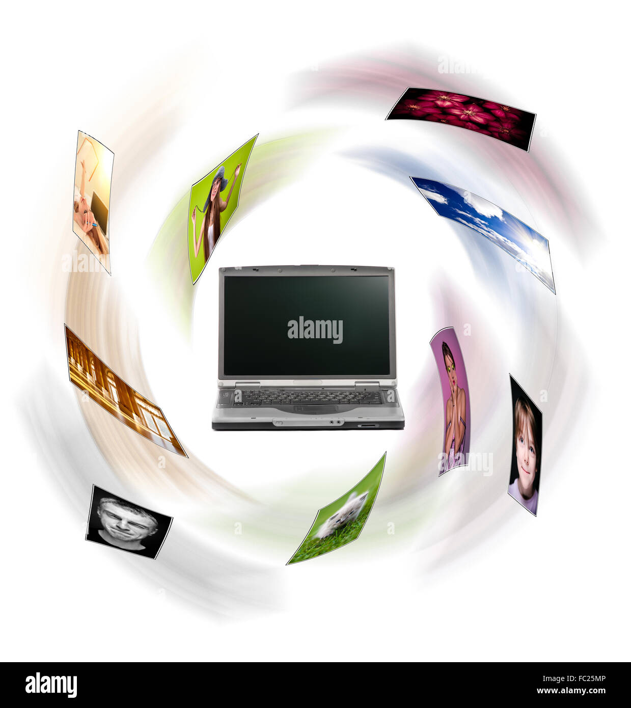 Un computer portatile e di immagini digitali battenti. Foto Stock