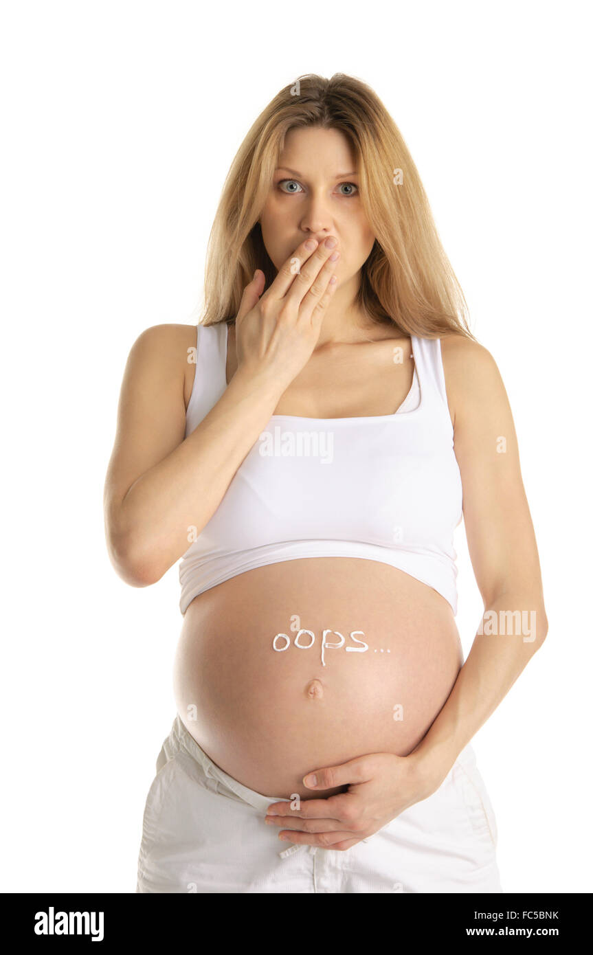 Sorpreso da donna in stato di gravidanza Foto Stock