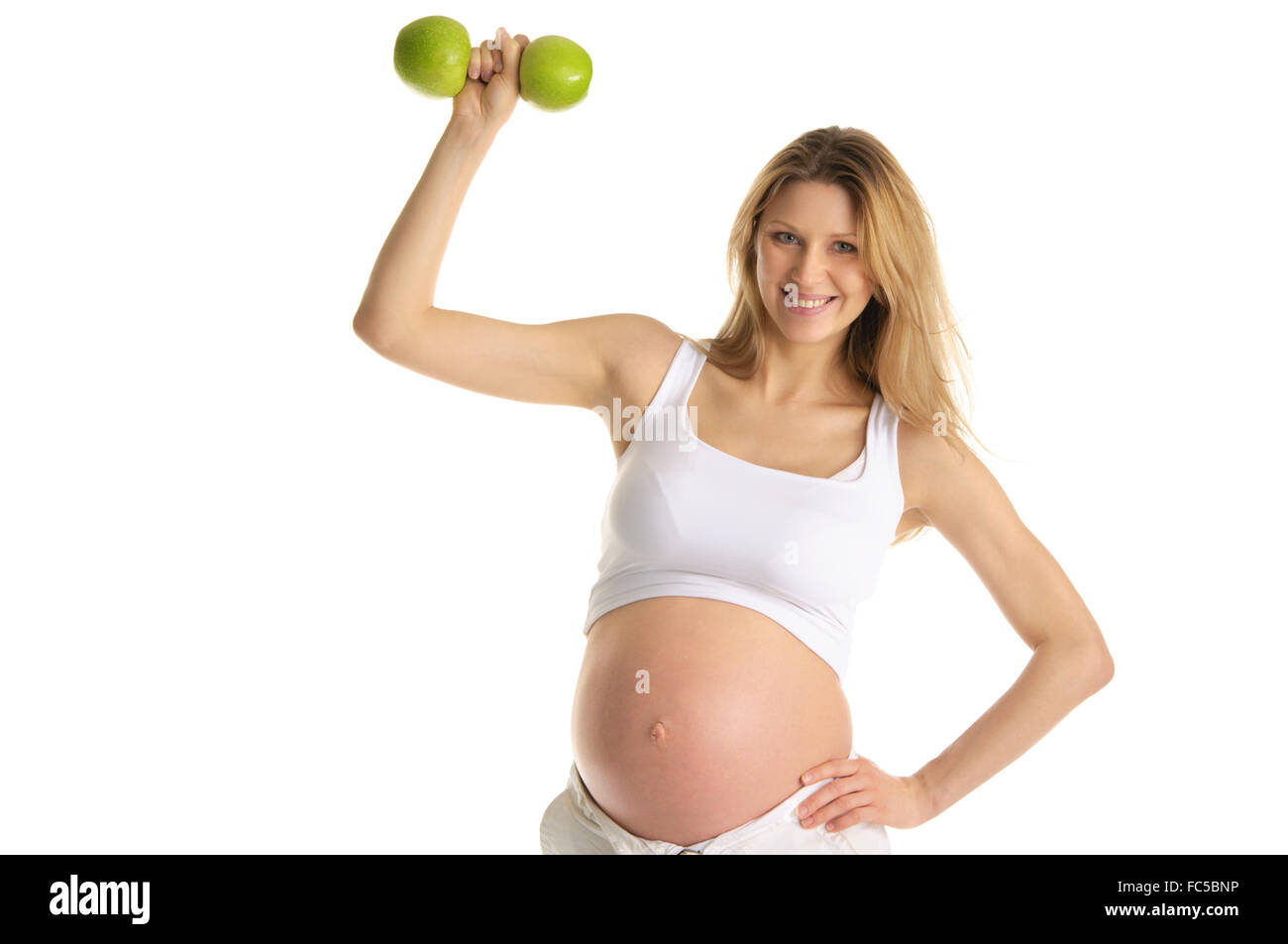 Donna incinta coinvolta nel fitness Foto Stock