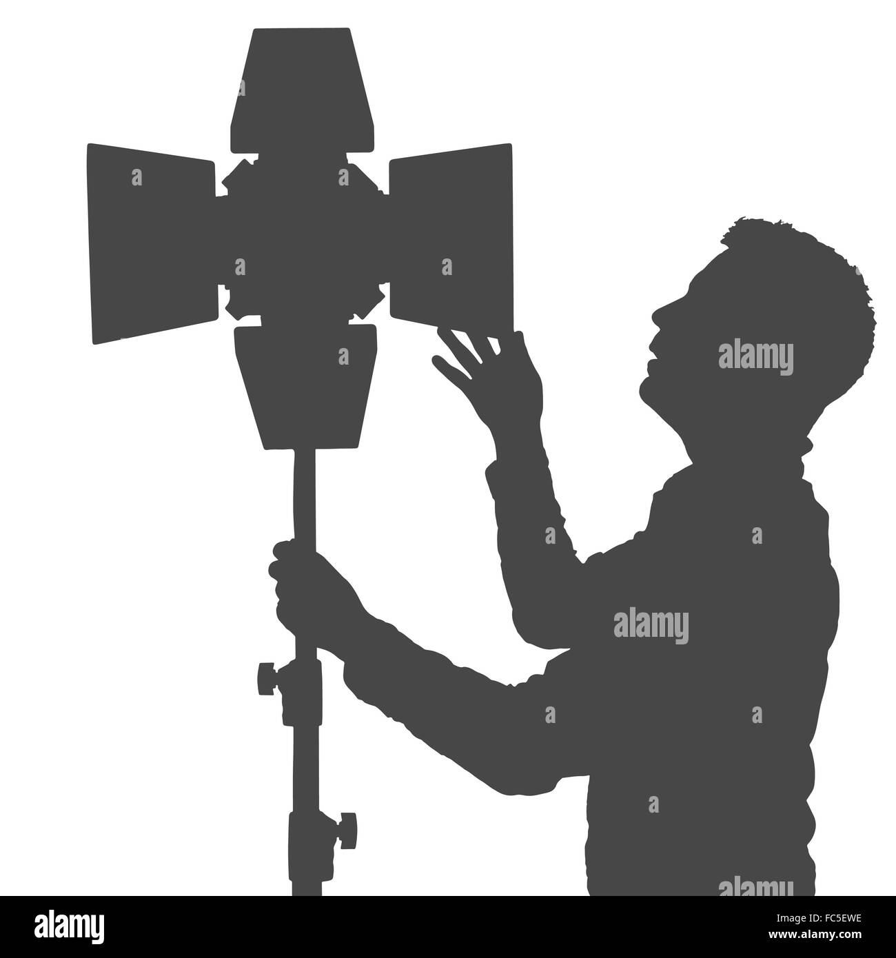 Fotografo controlla gli apparecchi di illuminazione per la fotografia. illustrazione vettoriale Foto Stock