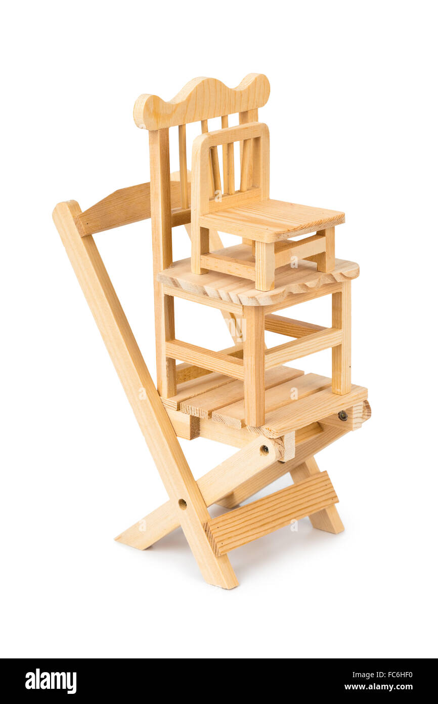 Giocattolo impilati con sedie in legno Foto Stock