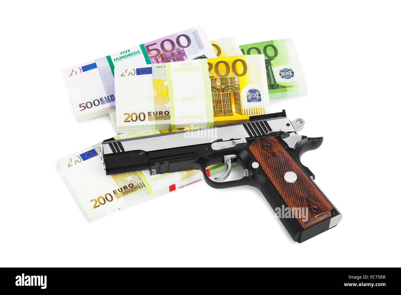 Pistola e soldi Foto Stock