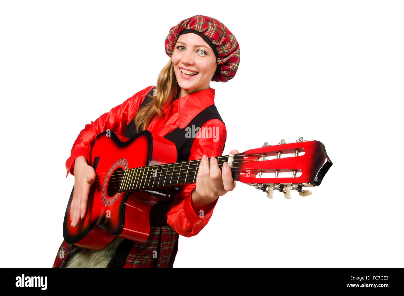 Funny donna in abiti scozzesi con la chitarra Foto Stock