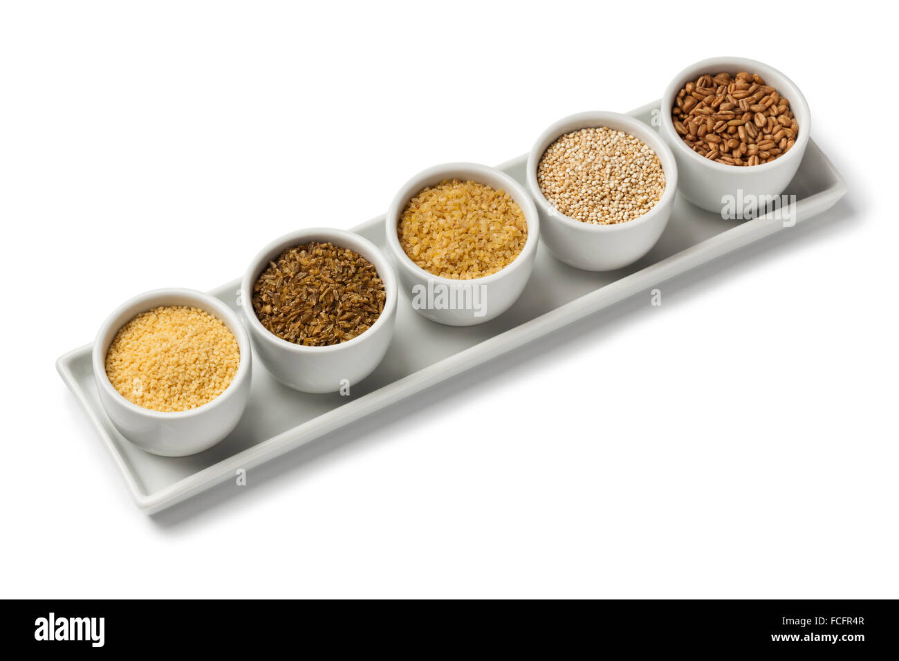 Bocce con materie mondo semi alimentari su sfondo bianco Foto Stock